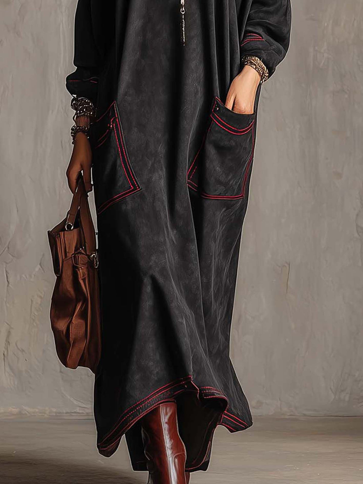 Manuela | Long black synthetic suede dress with contrasting red stitching and patch pockets