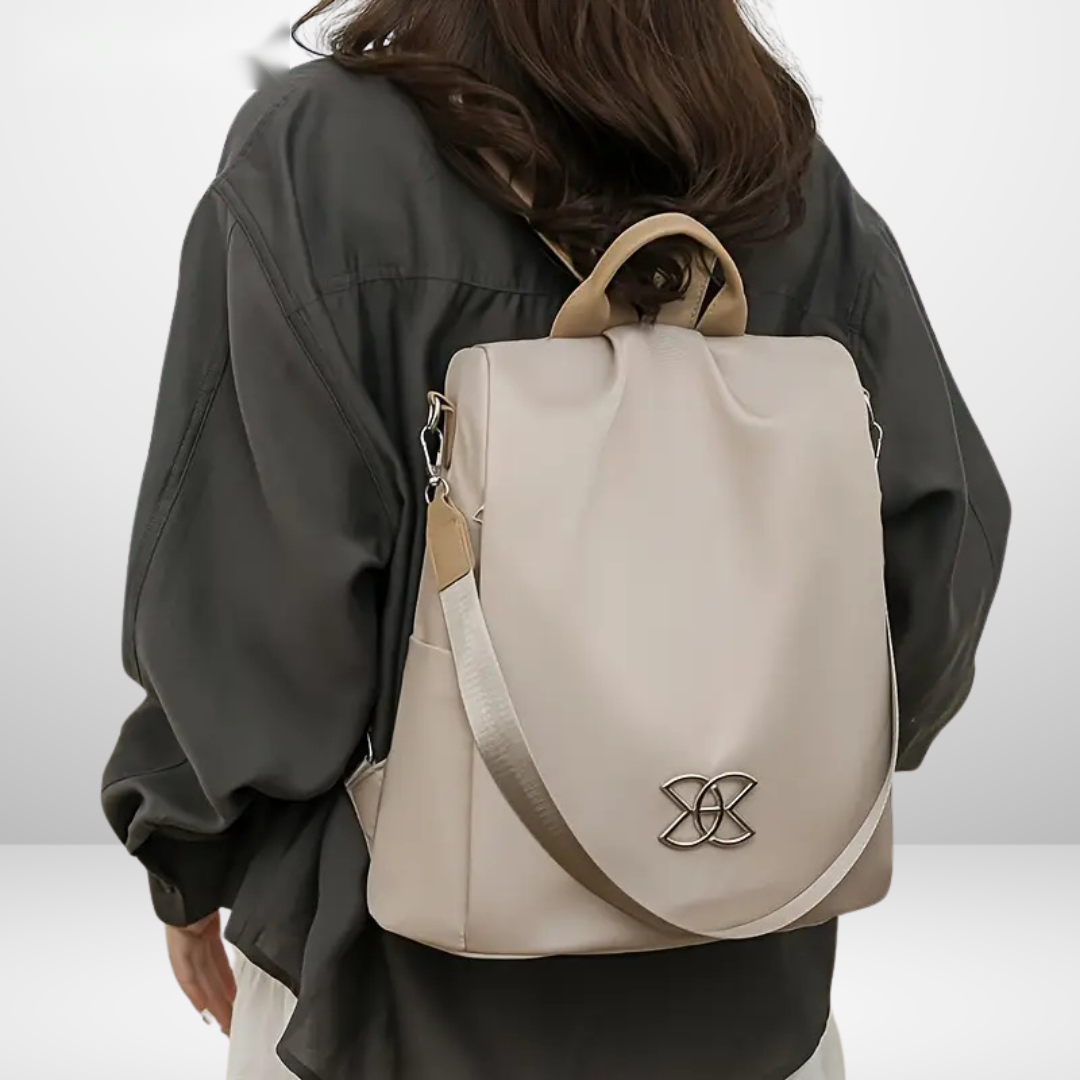 Lucius Anti-Theft Bag - Beige, worn over shoulder