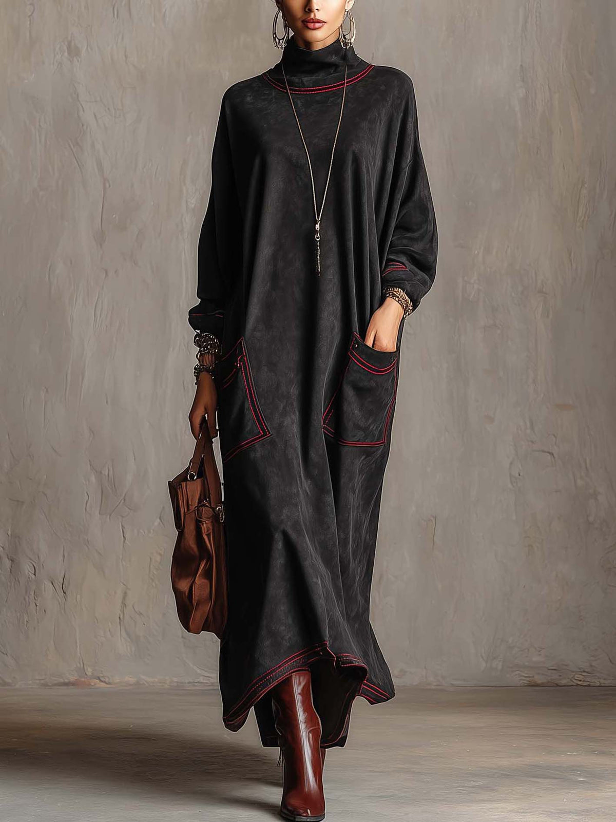 Manuela | Long black synthetic suede dress with contrasting red stitching and patch pockets